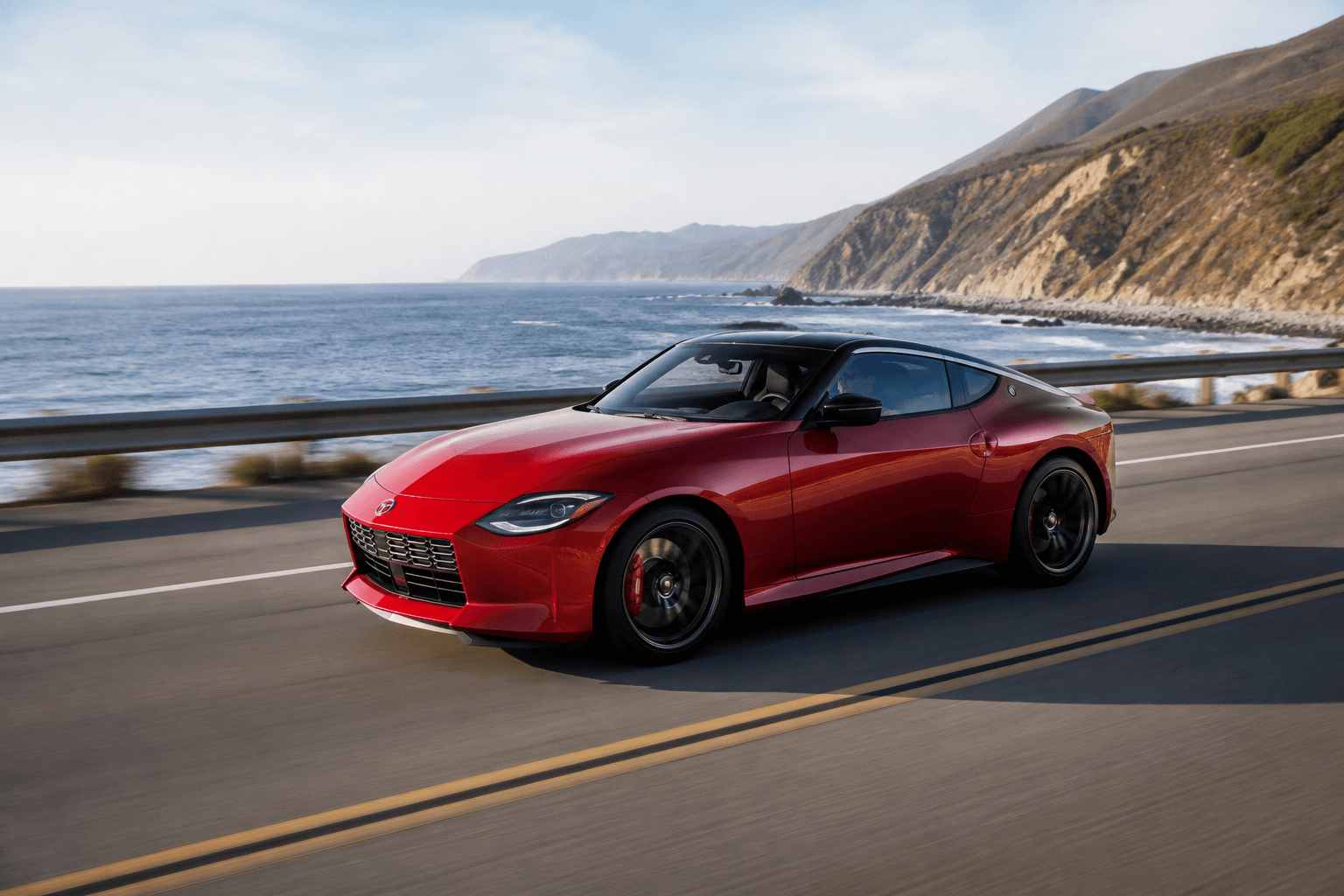 Metallic red Nissan Z on a coastal highway